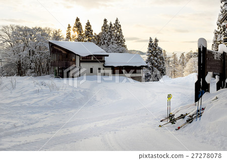 Ski lodges during early morning sunrise 27278078
