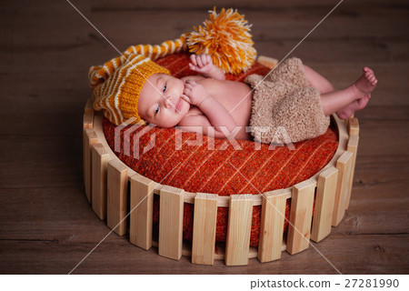 cute newborn baby in the basket 27281990