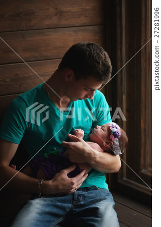 father with newborn baby in hands 27281996