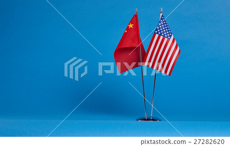 Two flags on a blue background, political concept Two flags on a blue background, political concept 27282620