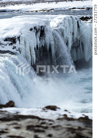 Closeup of frozen waterfall Godafoss, Iceland 27283759