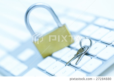 Security lock on white computer keyboard 27284880