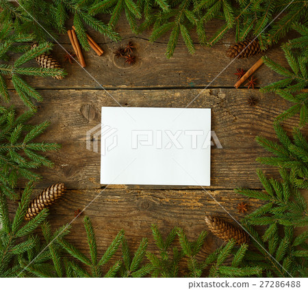 Christmas tree branch with cones, cinnamon sticks Christmas tree branch with cones, cinnamon sticks 27286488