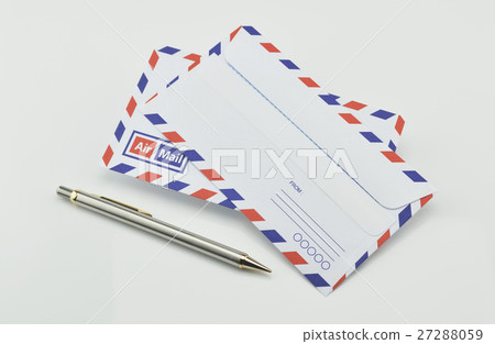 Stack of air mail envelopes with pen on white Stack of air mail envelopes with pen on white 27288059