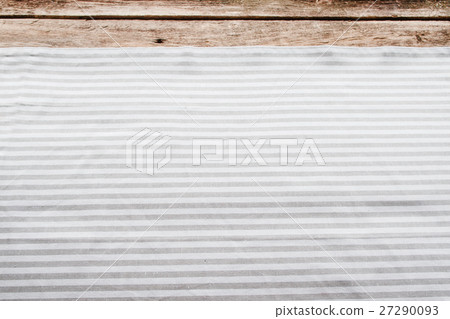 Fabric background, kitchen napkin on wooden table Fabric background, kitchen napkin on wooden table 27290093