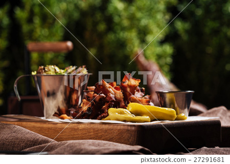 Close up of a tray with food standing in 27291681