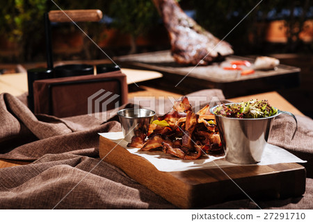 Bacon and salad standing in restaurant room Bacon and salad standing in restaurant room 27291710
