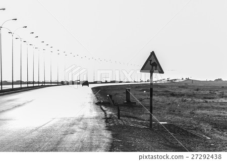 Camel warning sign desert highway in dhofar Camel warning sign desert highway in dhofar 27292438