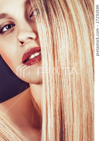 Beautiful young blonde woman  27292686