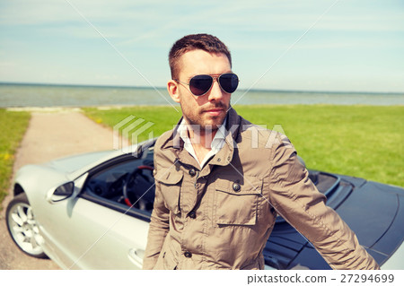 man near cabriolet car outdoors 27294699