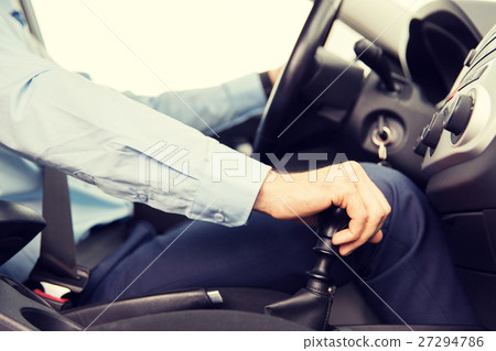 close up of young man driving car close up of young man driving car 27294786