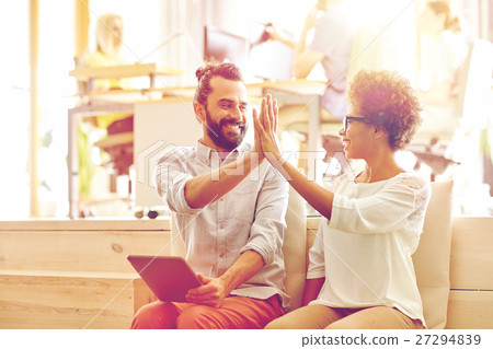 office workers with tablet pc making high five office workers with tablet pc making high five 27294839