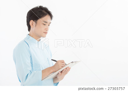 Male trainer wearing a surgical gown 27303757