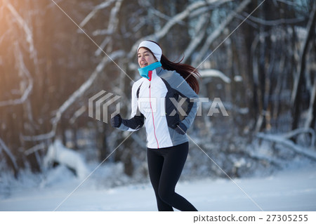 Girl on jog among forest Girl on jog among forest 27305255