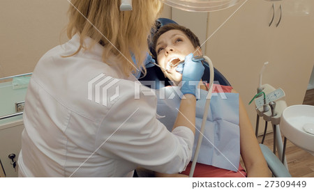 Woman at the dentist medical clinic office Woman at the dentist medical clinic office 27309449