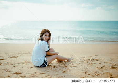 Bueatiful girl sit on the beach. Bueatiful girl sit on the beach. 27309775
