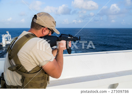 Armed guard on board sea going vessel in aden gulf Armed guard on board sea going vessel in aden gulf 27309786