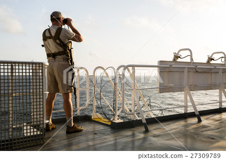 Guard on board sea going vessel in aden gulf Guard on board sea going vessel in aden gulf 27309789