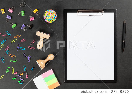 Black clipboard on a table Black clipboard on a table 27310870