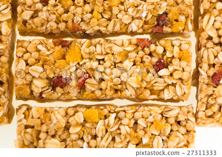 muesli bars with  dried fruit isolated background 27311333