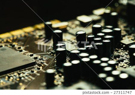 Computer motherboard closeup yellow gray color Computer motherboard closeup yellow gray color 27311747