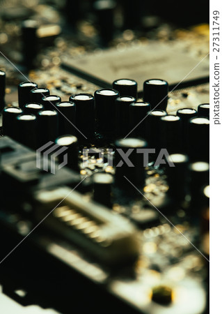 Computer motherboard closeup yellow gray color Computer motherboard closeup yellow gray color 27311749