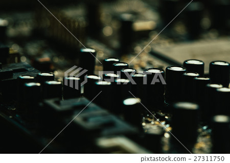 Computer motherboard closeup yellow gray color Computer motherboard closeup yellow gray color 27311750