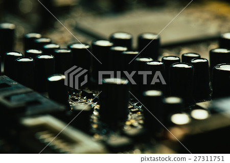 Computer motherboard closeup yellow gray color Computer motherboard closeup yellow gray color 27311751