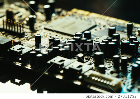 Computer motherboard closeup yellow gray color Computer motherboard closeup yellow gray color 27311752
