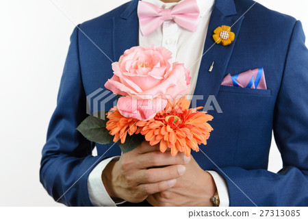 man in blue suit carry flowers man in blue suit carry flowers 27313085