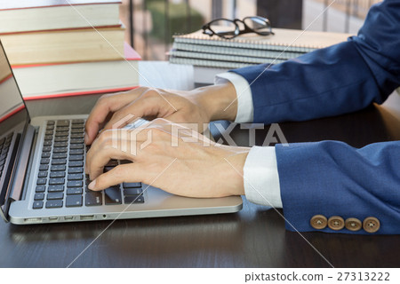 man working in office with computer man working in office with computer 27313222