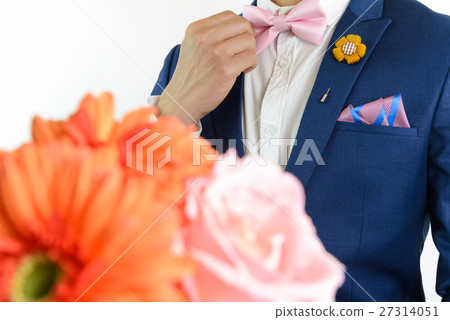 man in blue suit carry flowers man in blue suit carry flowers 27314051