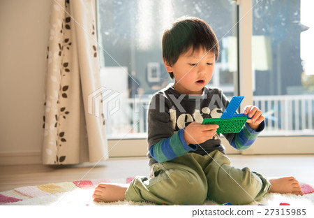 Boys playing in the room Boys playing in the room 27315985