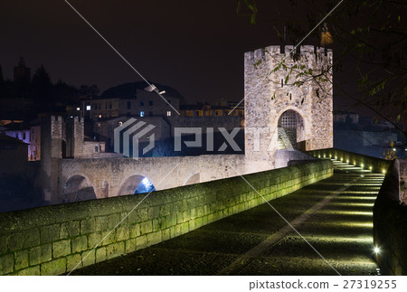 gate on bridge in night. Besalu 27319255