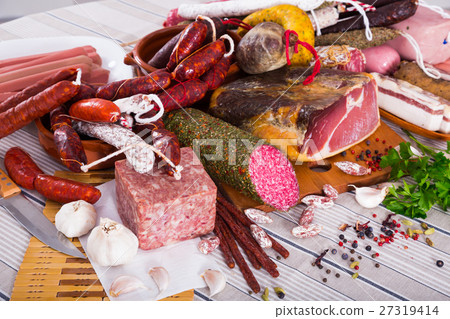 Variety of meats on table Variety of meats on table 27319414