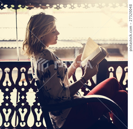 Young Woman Reading Book Concept 27320048