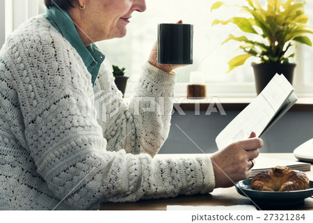 Senior Woman Casual Pensioner Reading Dining Concept 27321284