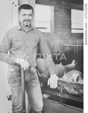 Man working on animal farm Man working on animal farm 27322209