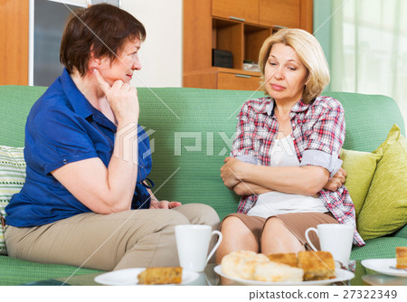 Two female having serious conversation 27322349