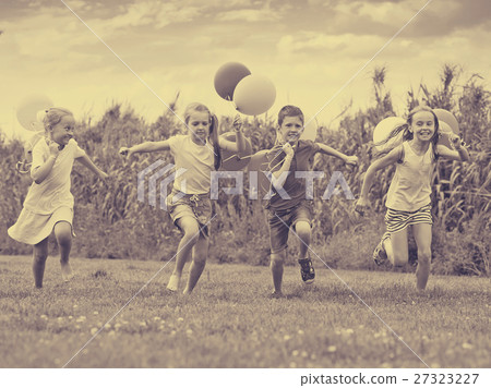Children play games with ballons Children play games with ballons 27323227