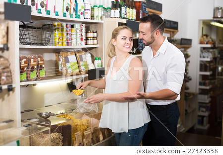 Couple buying rice sold 27323338