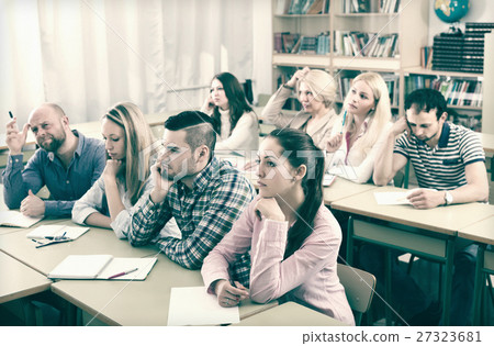 Bored students sitting at lesson 27323681