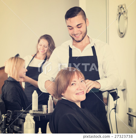Mature woman in the barbershop. Mature woman in the barbershop. 27323738