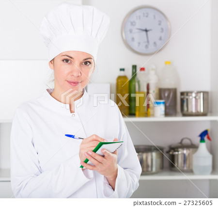 Female cook in cafe Female cook in cafe 27325605