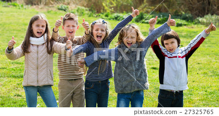 Junior school girls and boys spending time together Junior school girls and boys spending time together 27325765