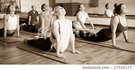 People relaxing and enjoying yoga 27326277