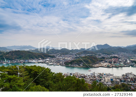 A stunning autumn view of shipyards and numerous islands from Onomichi, Hiroshima. A stunning autumn view of shipyards and numerous islands from Onomichi, Hiroshima. 27329346