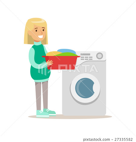 Girl Loading Washing Machine With Clothes Smiling Girl Loading Washing Machine With Clothes Smiling 27335582