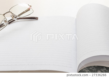Eyeglasses and Notepad with blank page Eyeglasses and Notepad with blank page 27336266