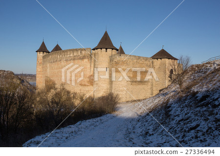 Ancient stone castle in winter. Landscape. Ancient stone castle in winter. Landscape. 27336494